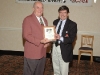 Joe Wilkie  With presenter John Stinsmen (left)